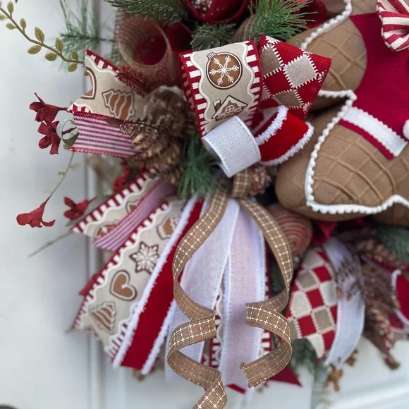 Adorable Red and White Gingerbread Holiday Wreath. Aprox 26” wide